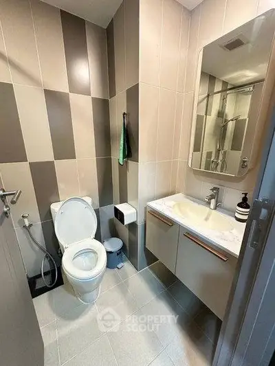 Modern bathroom with sleek fixtures and stylish tile design