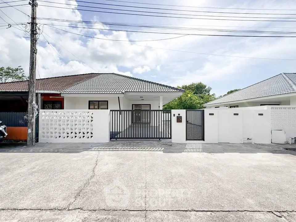 Charming single-story home with modern design and gated entrance in a serene neighborhood.