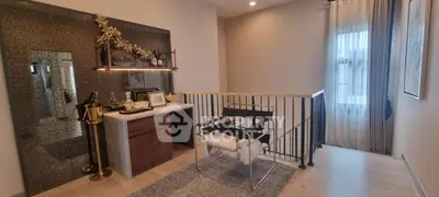 Stylish modern interior with chic chair and elegant decor in cozy living space.