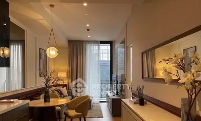 Elegant living room with modern decor and large window offering natural light.