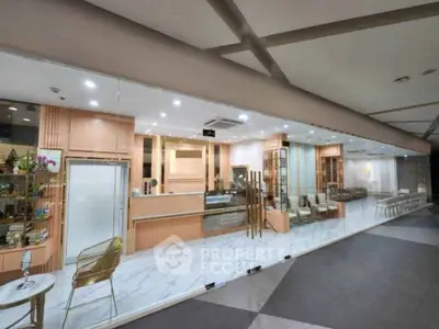 Modern commercial space with glass walls and elegant interior design