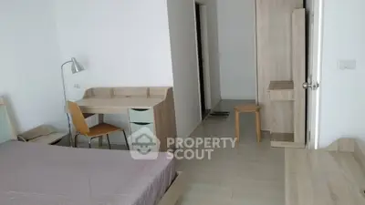 Modern bedroom with minimalist furniture and natural light