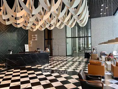 Luxurious hotel lobby with modern design and elegant seating area