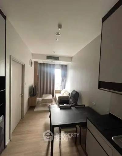 Modern living room with sleek furniture and natural light