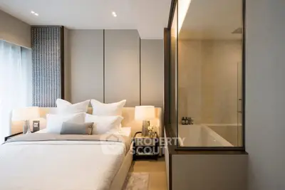 Luxurious bedroom with ensuite bathroom featuring modern design and elegant decor.
