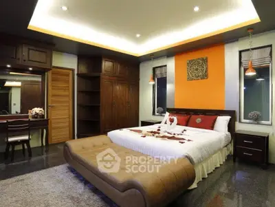 Luxurious bedroom with elegant decor and ambient lighting