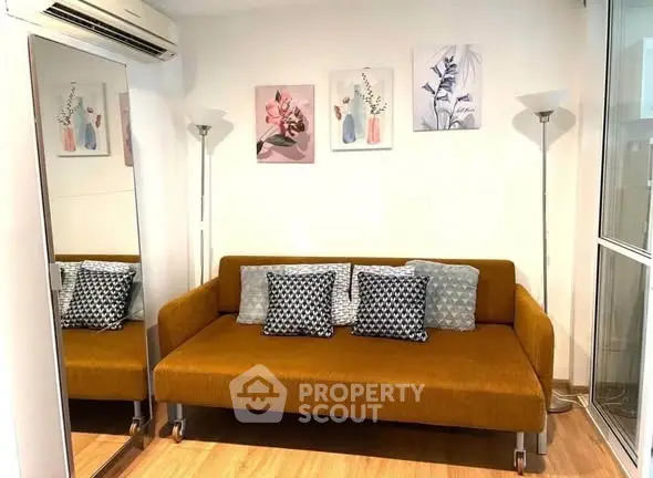 Cozy living room with stylish sofa and modern decor