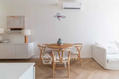 Modern living room with stylish dining area and minimalist decor