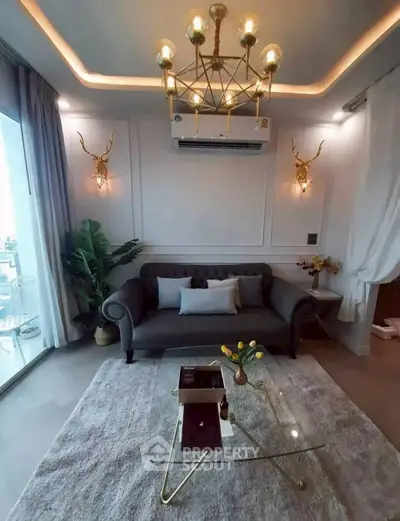 Luxurious living room with elegant decor and modern chandelier