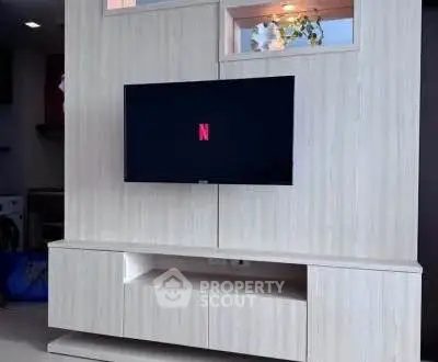Modern living room with sleek TV unit and stylish decor