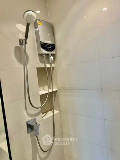 Modern bathroom shower with sleek design and built-in shelves