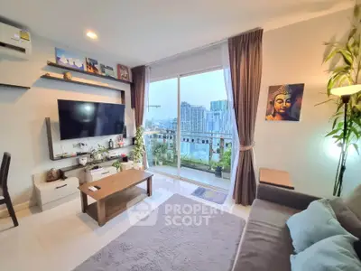 Modern living room with city view, stylish decor, and large windows for natural light.
