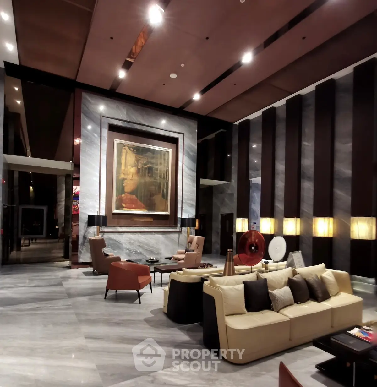 Luxurious modern lobby with elegant seating and art decor