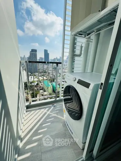 Modern balcony with city view and washing machine, perfect for urban living.