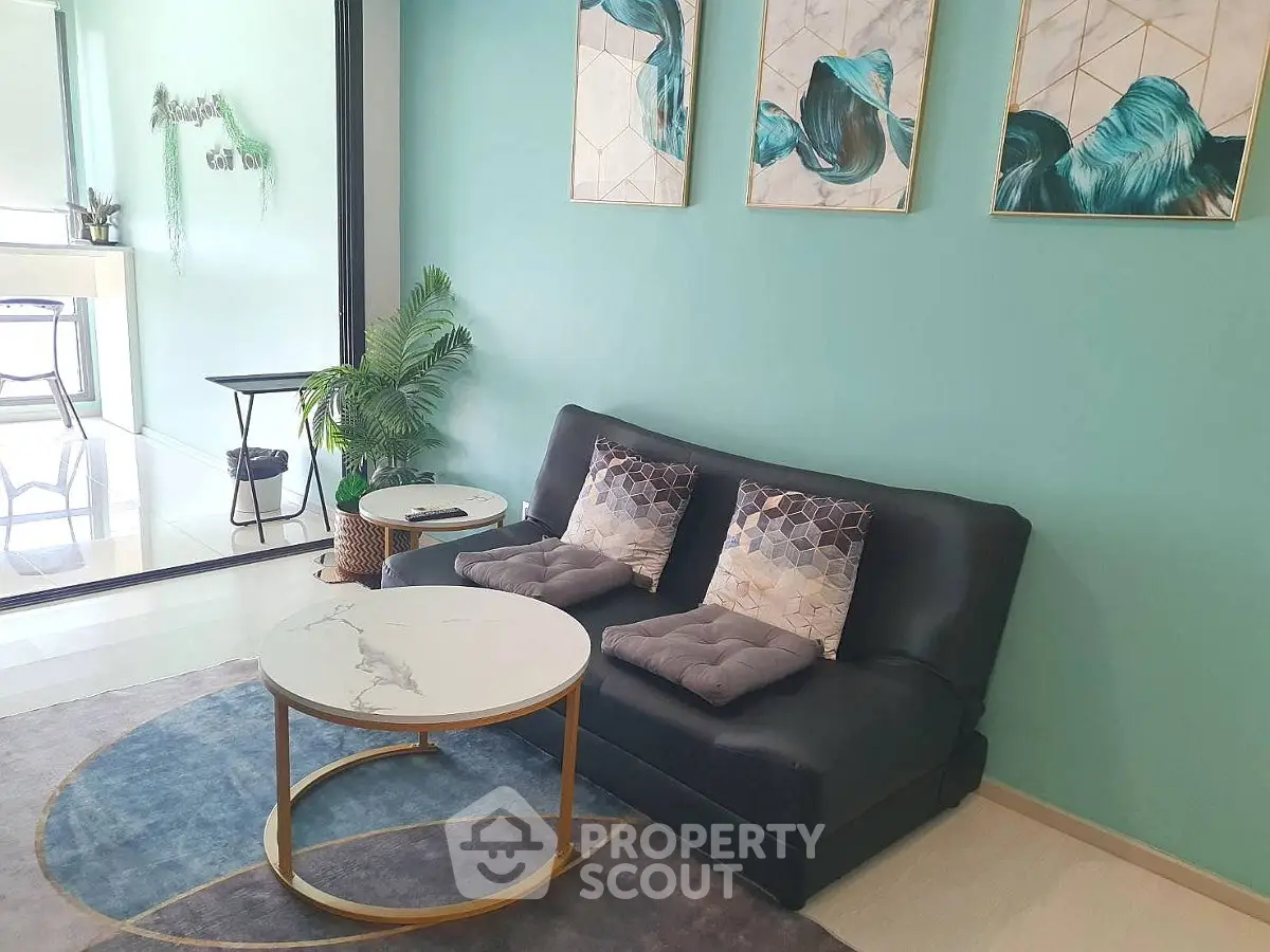 Stylish living room with modern decor and elegant furniture in a contemporary apartment.