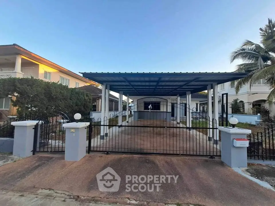 Spacious residential property with covered parking and gated entrance