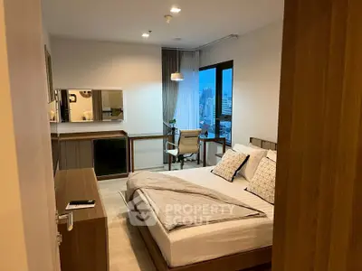 Modern bedroom with city view, featuring stylish decor and cozy ambiance.