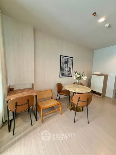 Modern living room with stylish furniture and elegant decor, perfect for urban living.