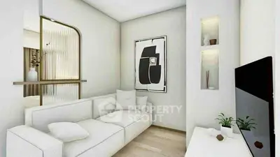 Modern living room with sleek design and contemporary art, featuring a cozy white sofa and stylish decor.