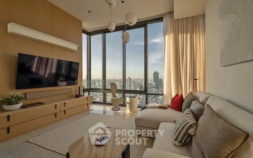 Luxurious living room with panoramic city views, modern decor, and elegant furnishings.