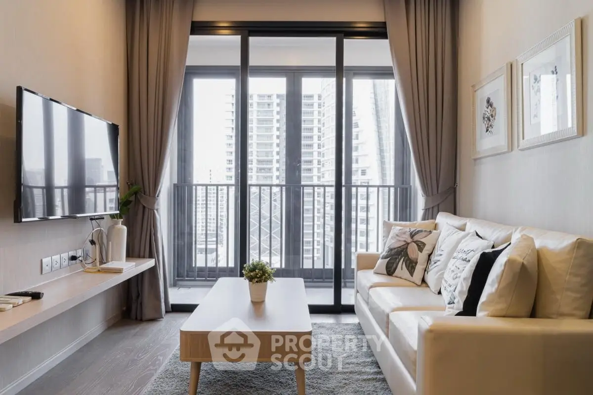 Modern living room with balcony view in high-rise apartment