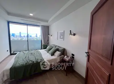 Modern bedroom with city view and elegant decor