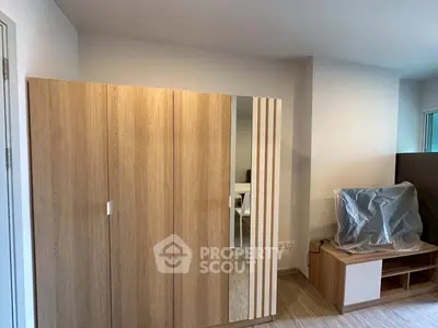 Modern bedroom with wooden wardrobe and stylish furniture