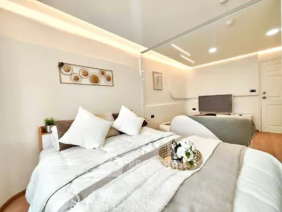 Luxurious bedroom with modern decor and cozy ambiance