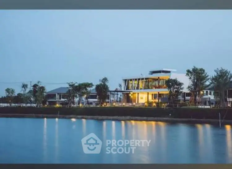 Stunning waterfront property with modern architecture and serene surroundings.