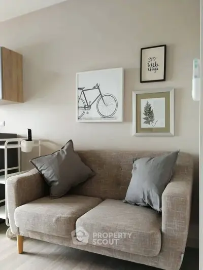 Cozy living room with stylish decor and comfortable sofa, perfect for relaxation.