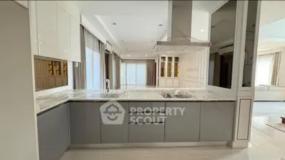 Luxurious modern kitchen with sleek cabinetry and open layout design