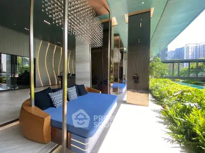 Luxurious modern living room with elegant decor and large windows offering stunning city views.