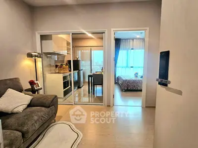 Modern apartment interior with cozy living room, sleek kitchen, and inviting bedroom.
