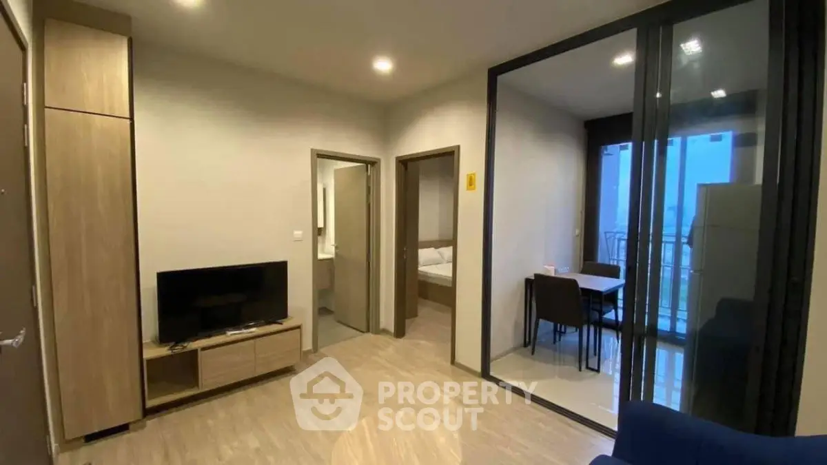 Modern living room with open layout and balcony view