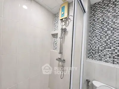 Modern bathroom with sleek shower and stylish tile design