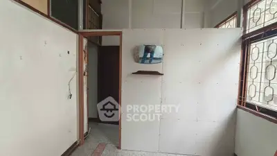 Cozy interior space with natural light and unique wall design