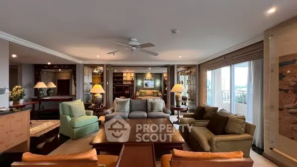 Spacious living room with elegant decor and ample natural light