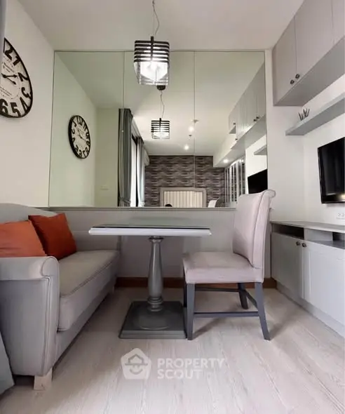 Modern living room with stylish decor and cozy seating area