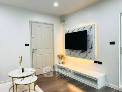 Modern living room with stylish TV setup and elegant marble decor