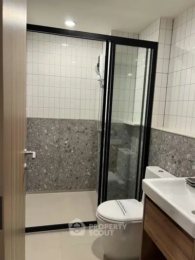 Modern bathroom with sleek glass shower and contemporary design