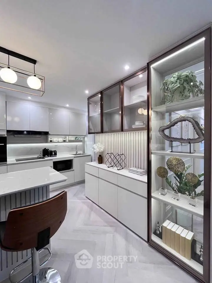 Modern kitchen with sleek cabinetry and stylish decor