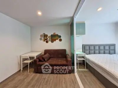 Modern studio apartment with stylish decor and comfortable furnishings
