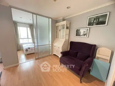 Charming bedroom with elegant decor and ample natural light