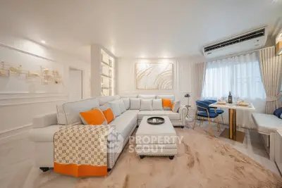 Luxurious living room with elegant decor and spacious seating area