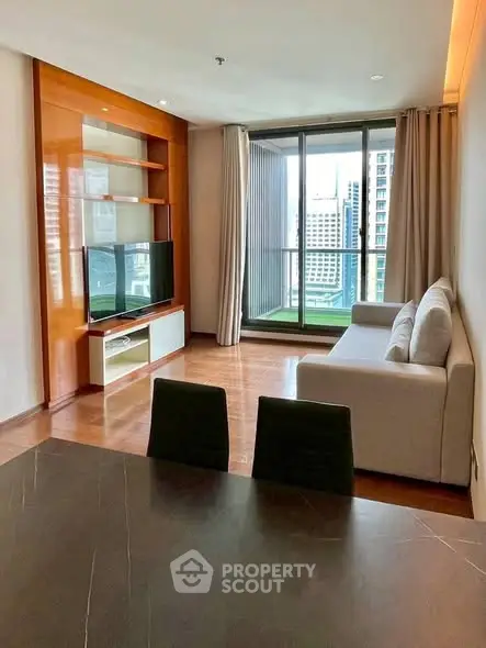 Modern living room with city view and stylish furniture