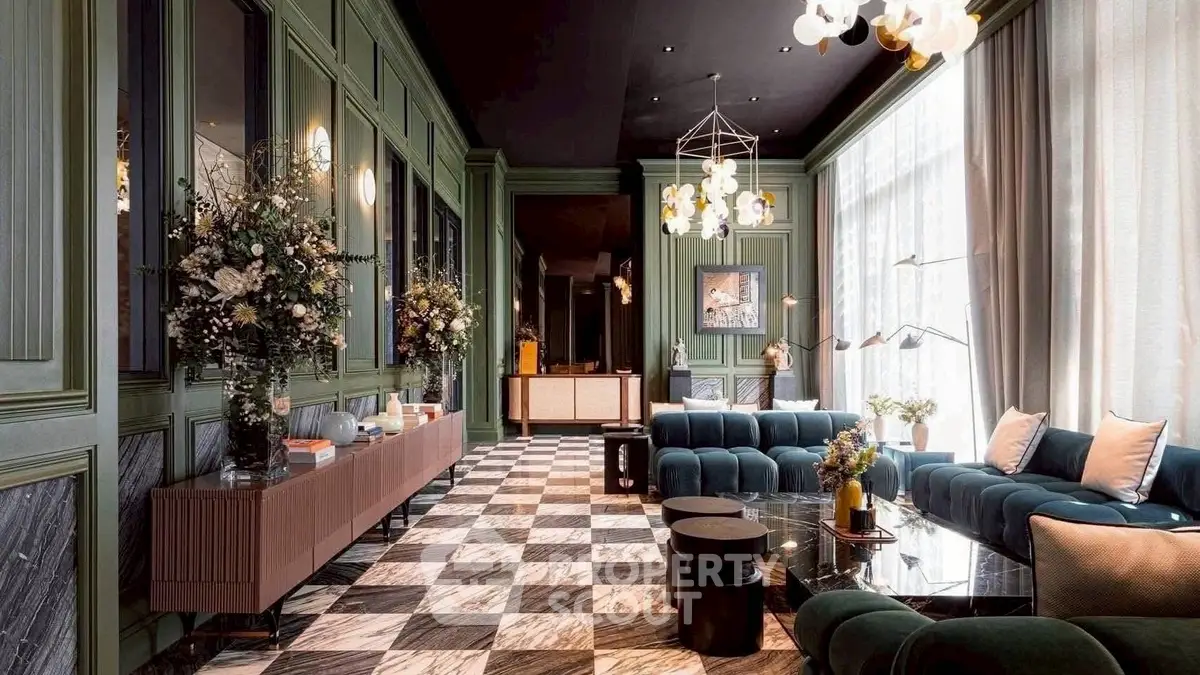 Luxurious living room with elegant decor and plush seating in a modern apartment.