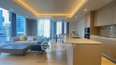 Luxurious modern living room with open kitchen and stunning city view