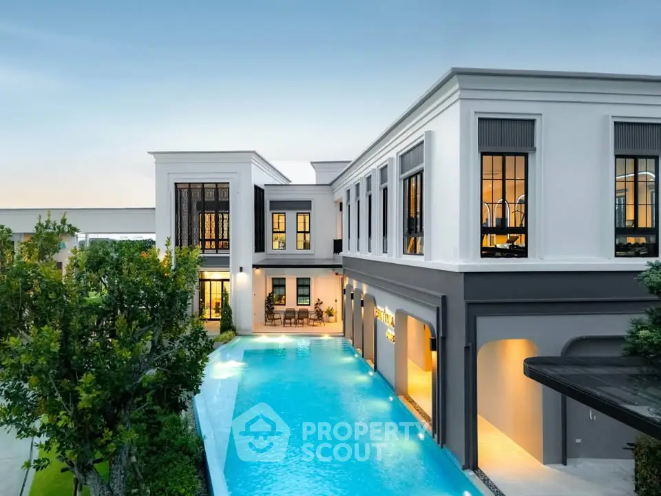 Luxurious modern building with stunning pool and elegant architecture, perfect for upscale living.