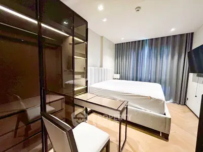 Luxurious modern bedroom with elegant furnishings and ambient lighting