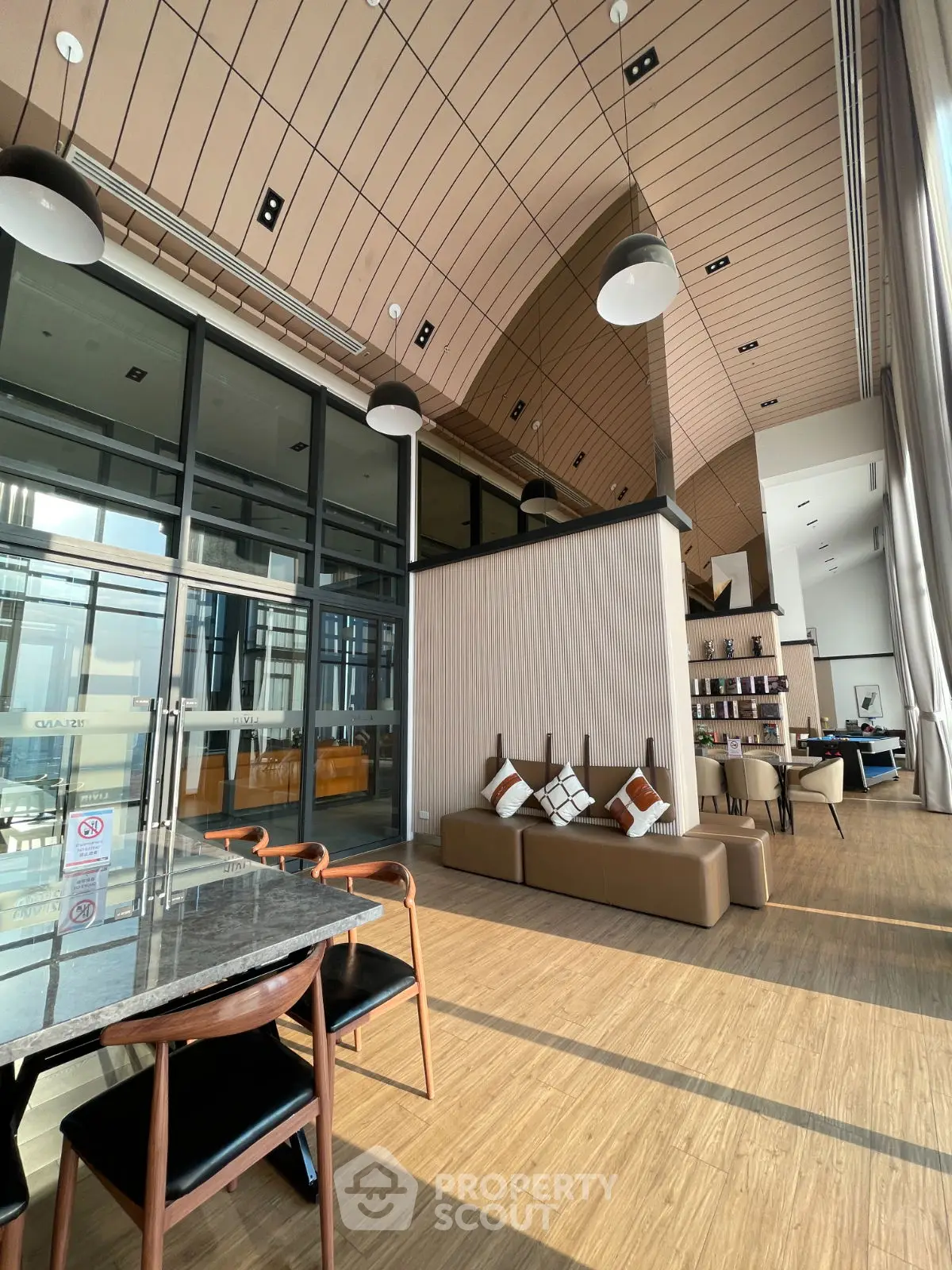 Luxurious modern living room with high ceilings and elegant decor